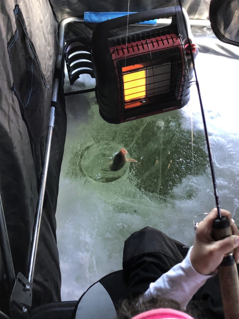 www.IAmCalgary.ca I Am Calgary Ice Fishing heater and catching fish