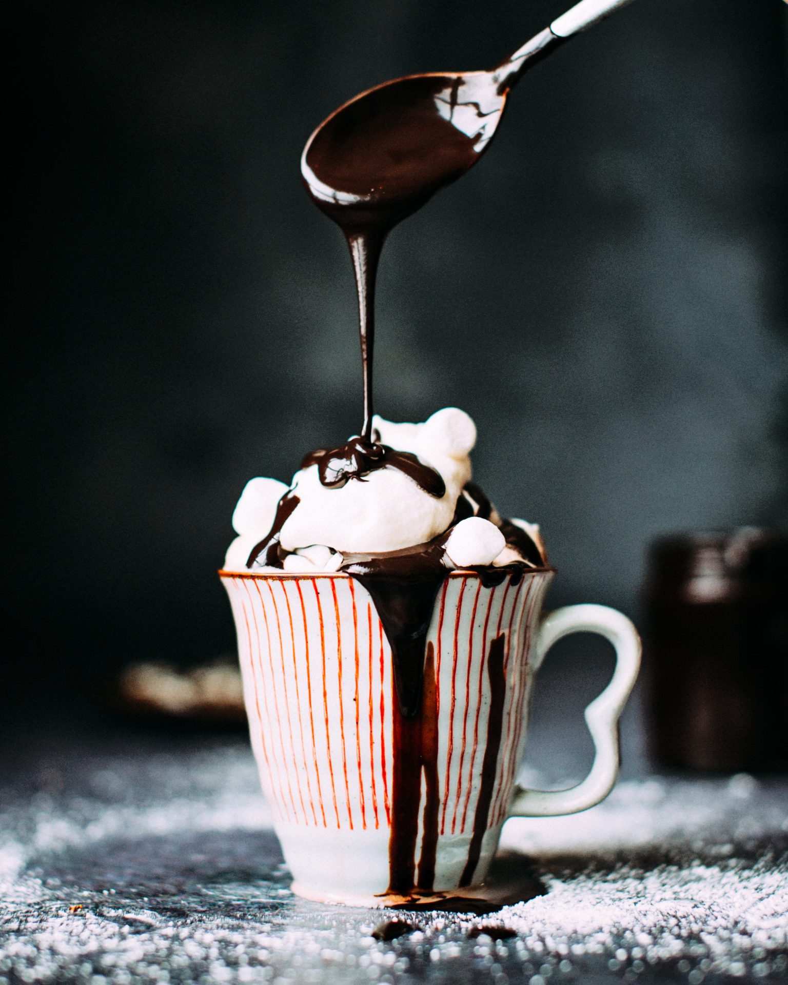 Chocolate pudding on vanilla ice cream in ceramic cup: Photo by Food Photographer | Jennifer Pallian on Unsplash
